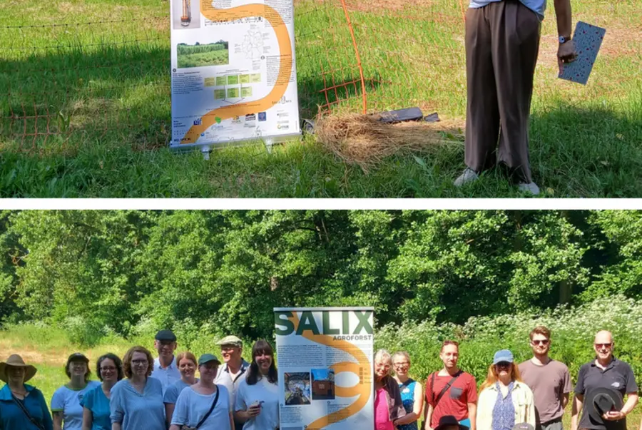 Referentin vor Rollup | Gruppenbild Exkursionsteilnehmende